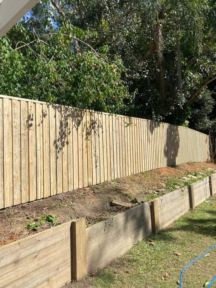 Lapped and capped timber fence